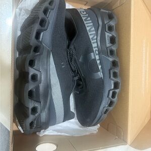 On Running women’s Black and Gray Athletic Shoes